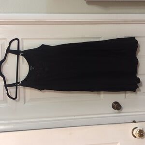 Flowy black dress with crochet detail